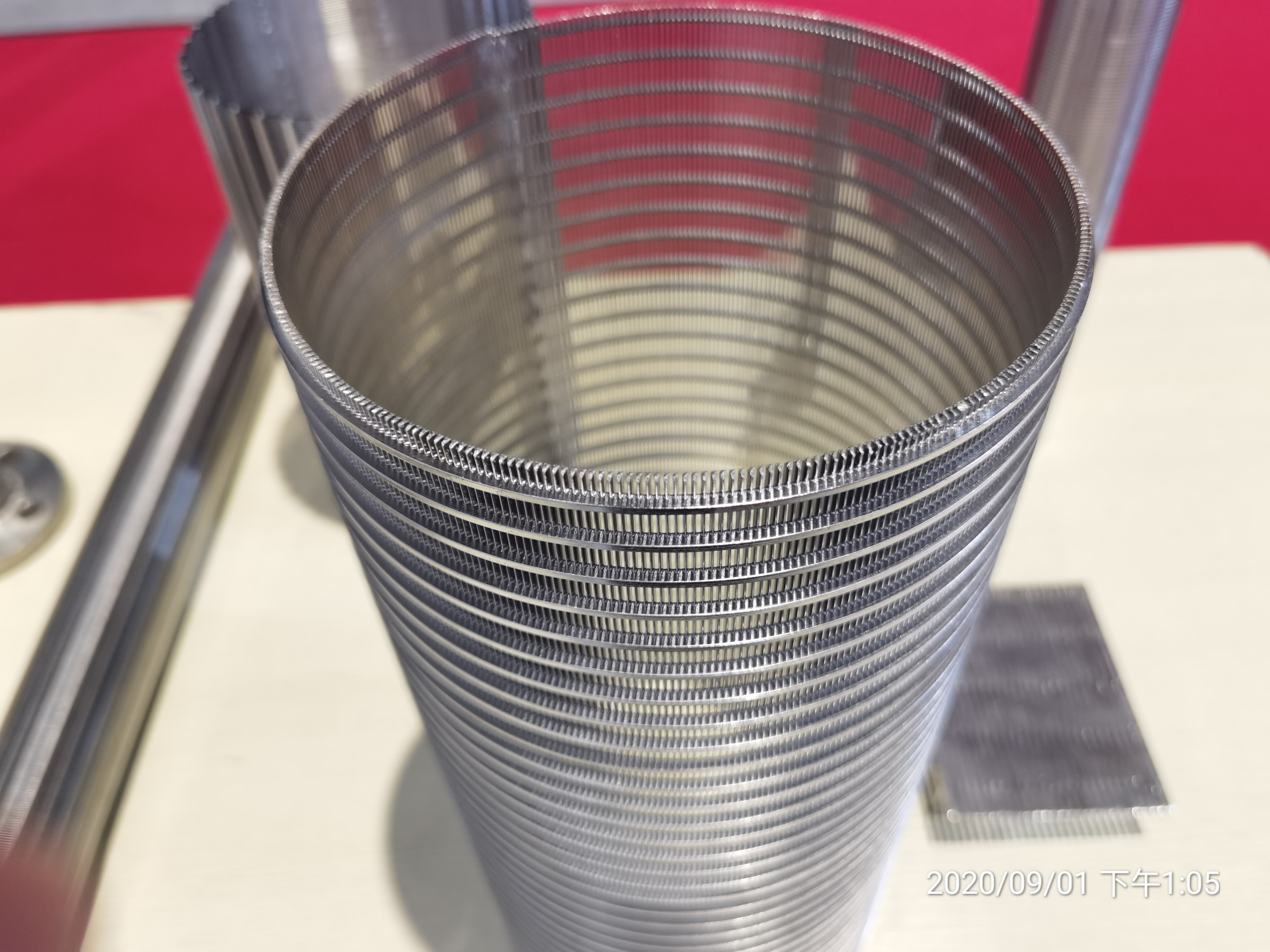 Reverse roll filter screen tube of perforated screen filter barrel